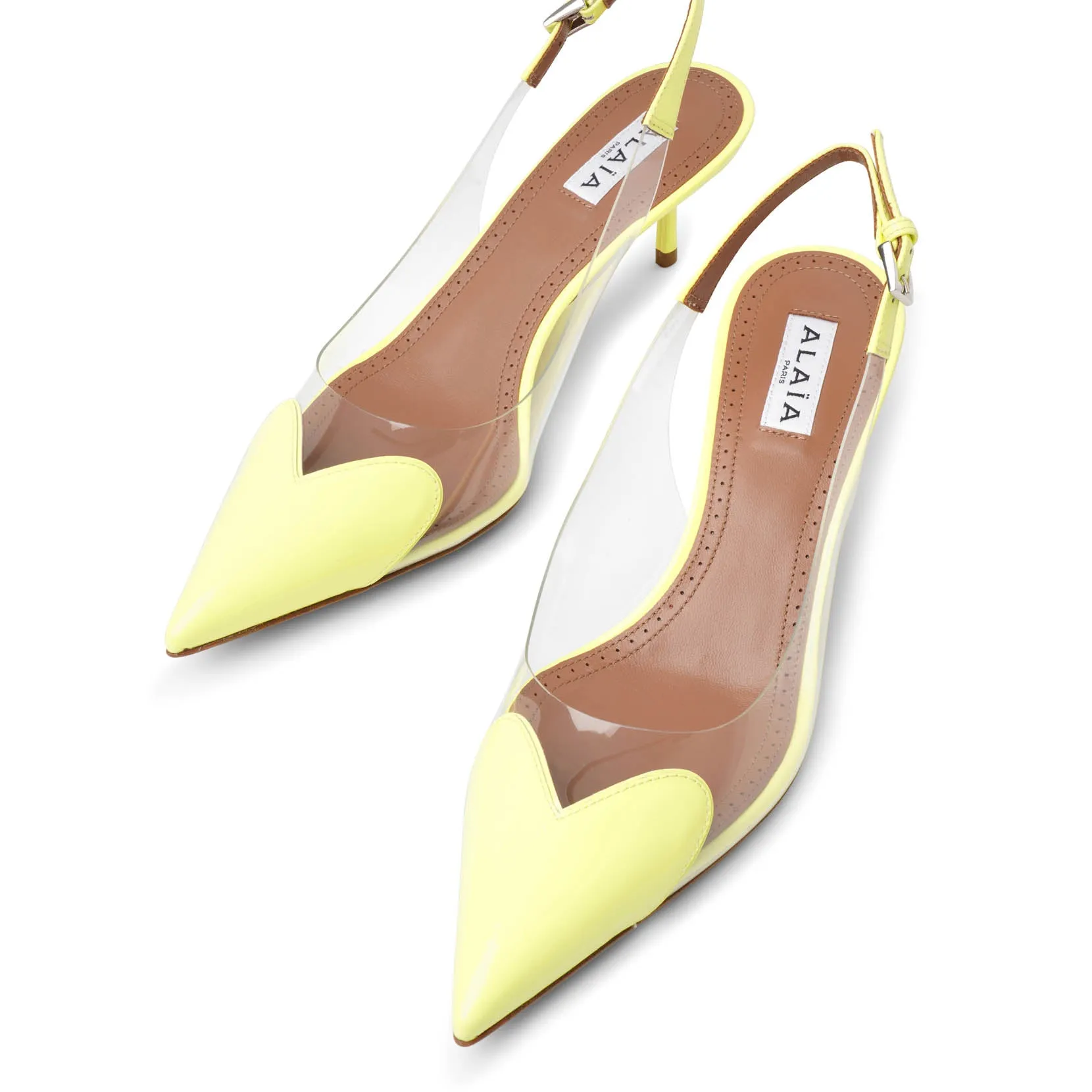 Coeur 55 yellow patent slingback pumps