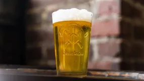 Cross-Axe Embossed Pint Glass