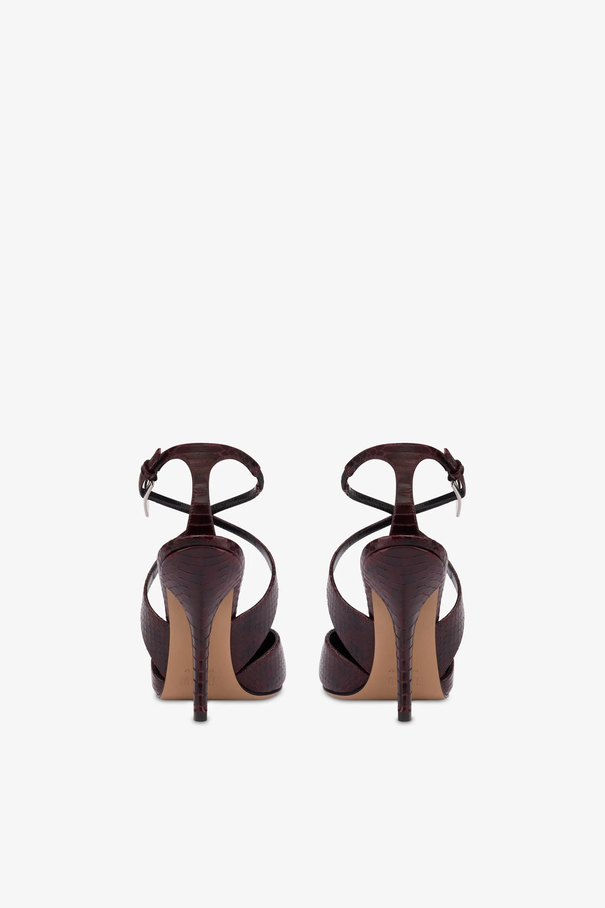 Pumps in burgundy python-printed leather